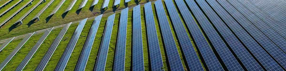 A solar plant in a green field