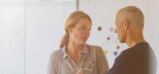 woman and a man in discussion