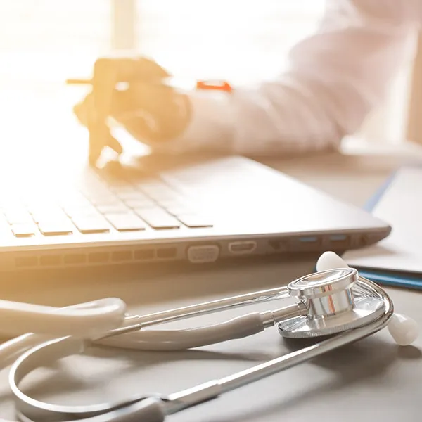 doctor using a laptop